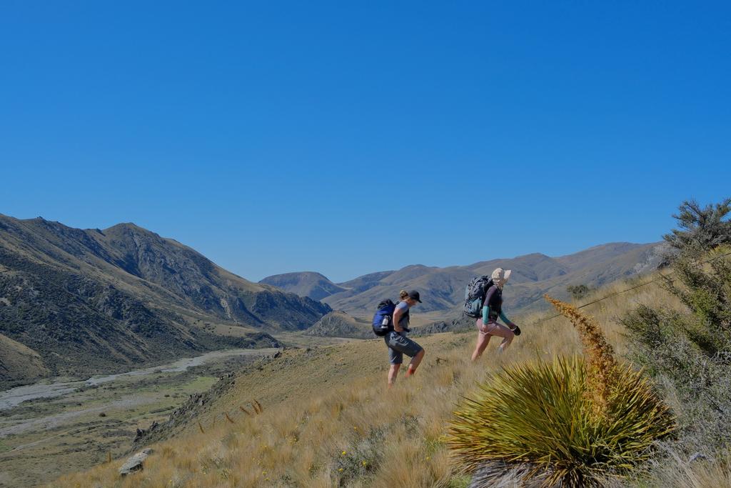Jen and Em hiking up Emily Hill.