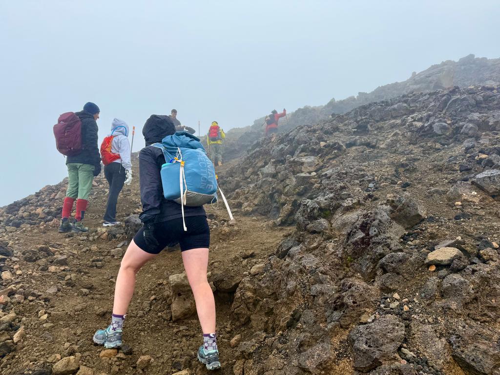 Jen powering through the crowds in an effort to stay warm.