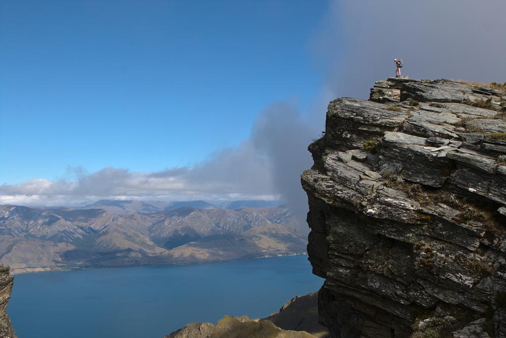 Looking down at some goats she spotted!