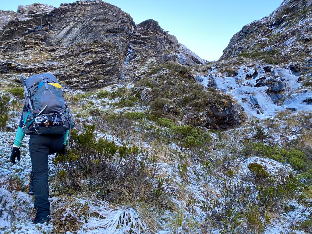 Jen climbing up to Scott Basin out of Kay Creek.