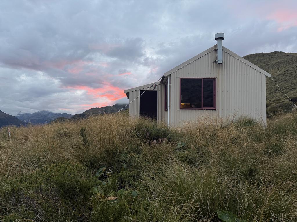 Carroll Hut under the setting sun.