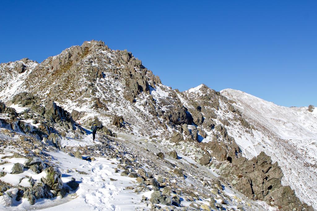 Jen on Robert Ridge as the track starts to sidle and crampons added a nice layer of safety.