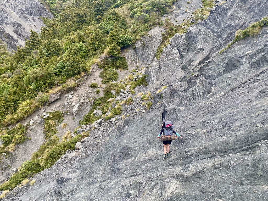 Jen crossing some precarious scree on the way to George Saddle.