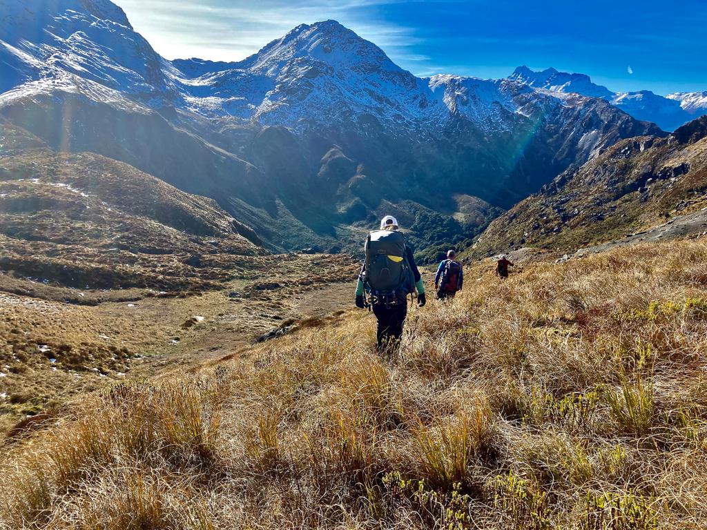 Descending through tussocks to Scott Creek - the end (almost) in sight.