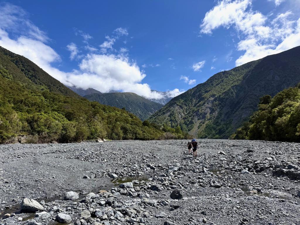Travelling dow the riverbed after passing the big slip on the track.