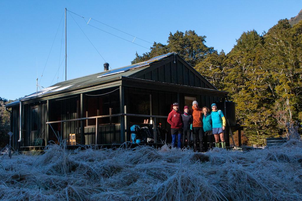 Finn, Jen, Justin, Francie and Neil outside Upper Caples Hut.