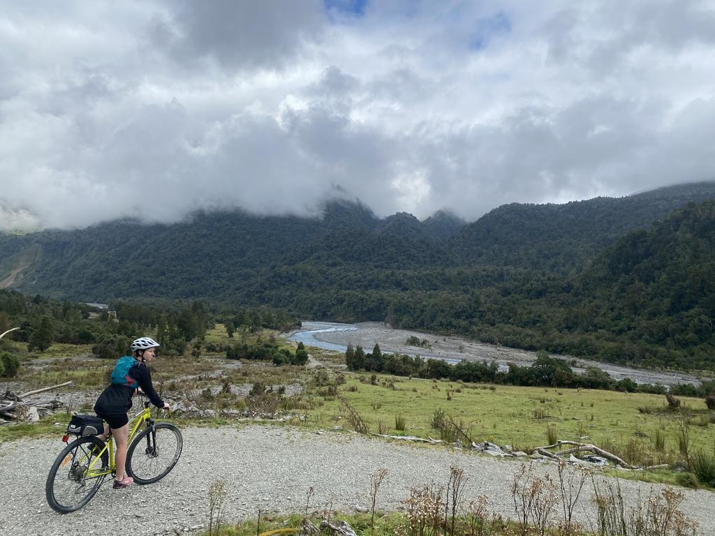 Jen enjoying the switchbacks and the view of the Arahura River.