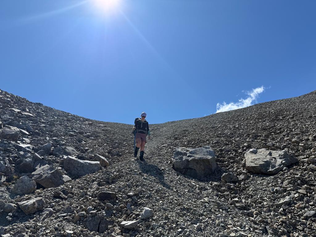 Jen taking the intial scree down into Dry Creek.