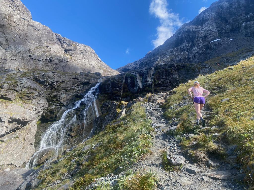 Jen heading up the last of the broken rocks before getting to the slabs.