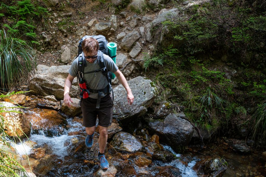 Tom keeping his feet dry.
