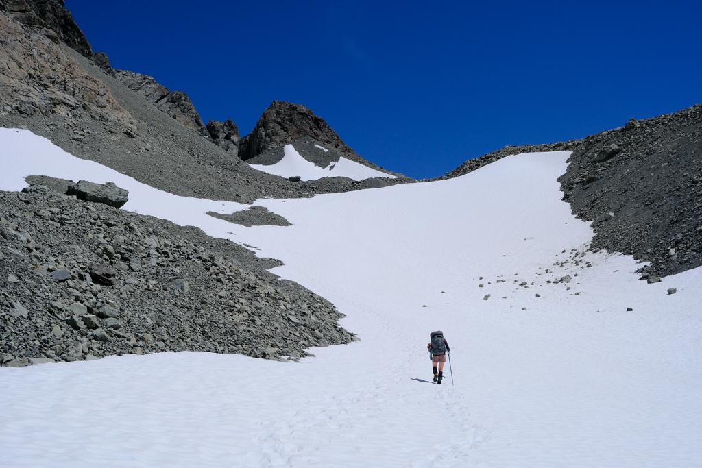 Jen on the snow field, not far until the top!
