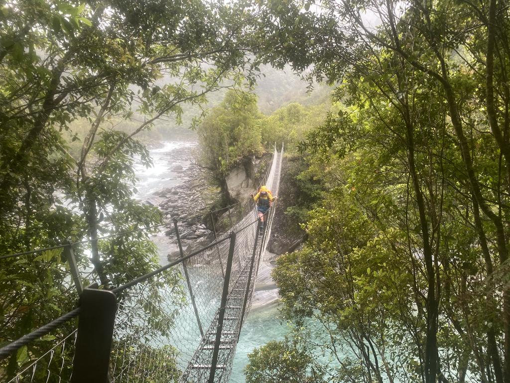 Jen - properly sodden - crossing the Cesspool, almost back at the car.