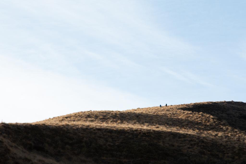 Watching Neil and Becky descend down to Roses Hut.
