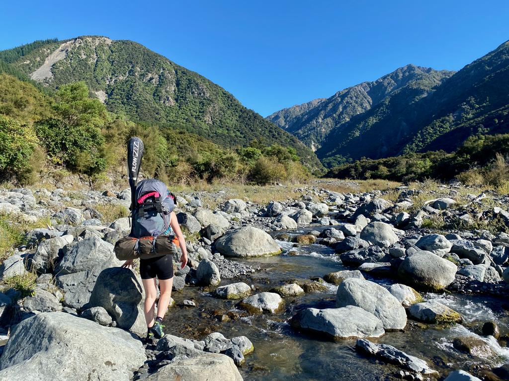 Jen walking up the lower George Stream.
