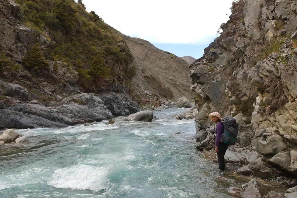 Jen looking at me questioningly as we consider clinging to rocks alongside the rapid.