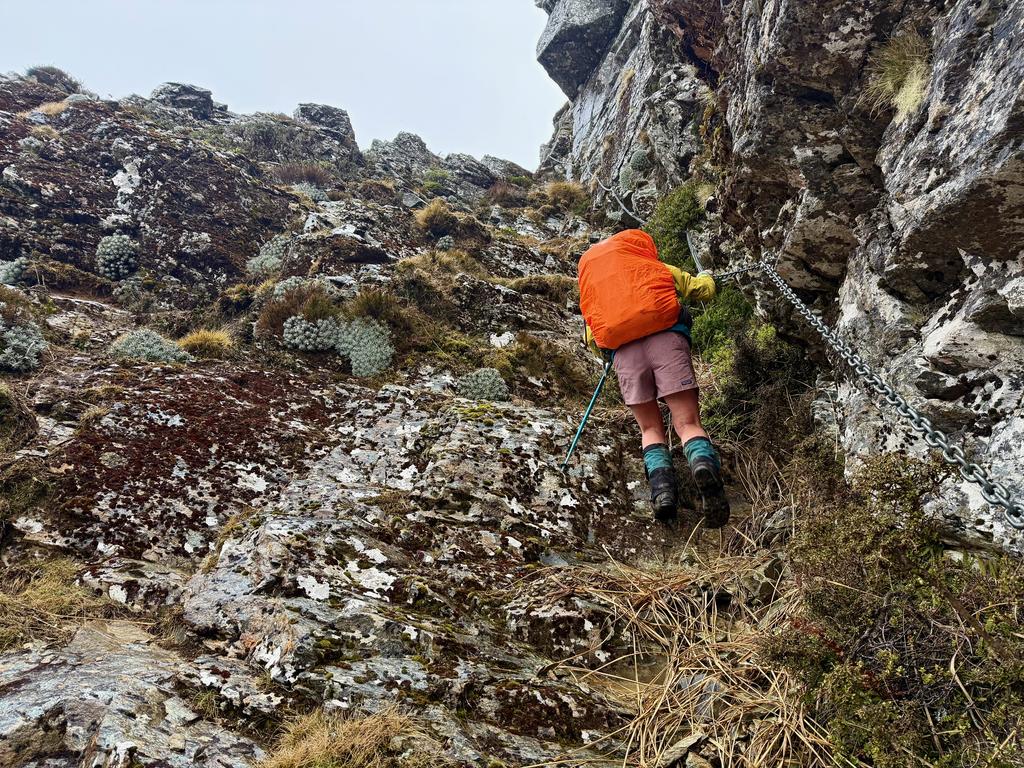 Jen climbing the 'chain ladder' below point 1496.