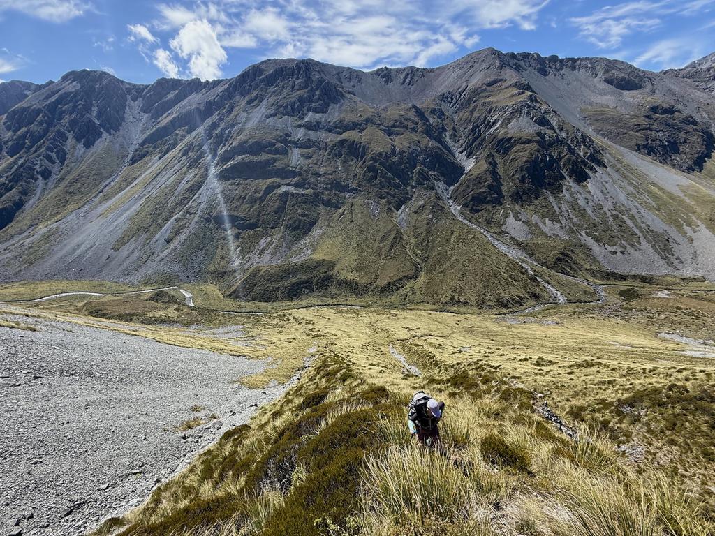 Climbing the first spur next to the prominent scree slope to the basin below pt. 1707 and 1555.