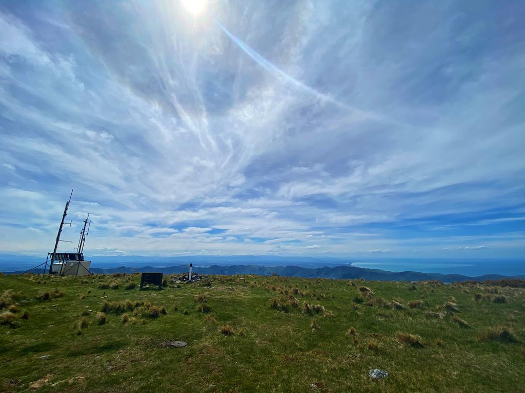 The summit of Mt Herbert with a [geodetic marker](https://www.geodesy.linz.govt.nz/gdb/index.cgi?mode=gmap&code=A588&sessionid=101605524377011642481008&action=+setfoundmarks+updatelist&foundmarklist=A5GX|A5GY|APH5|APH4|APH3|APH2|APH1|A588|EQVK|AG28|A296|A0YE&listaction=clear+add&mark=).