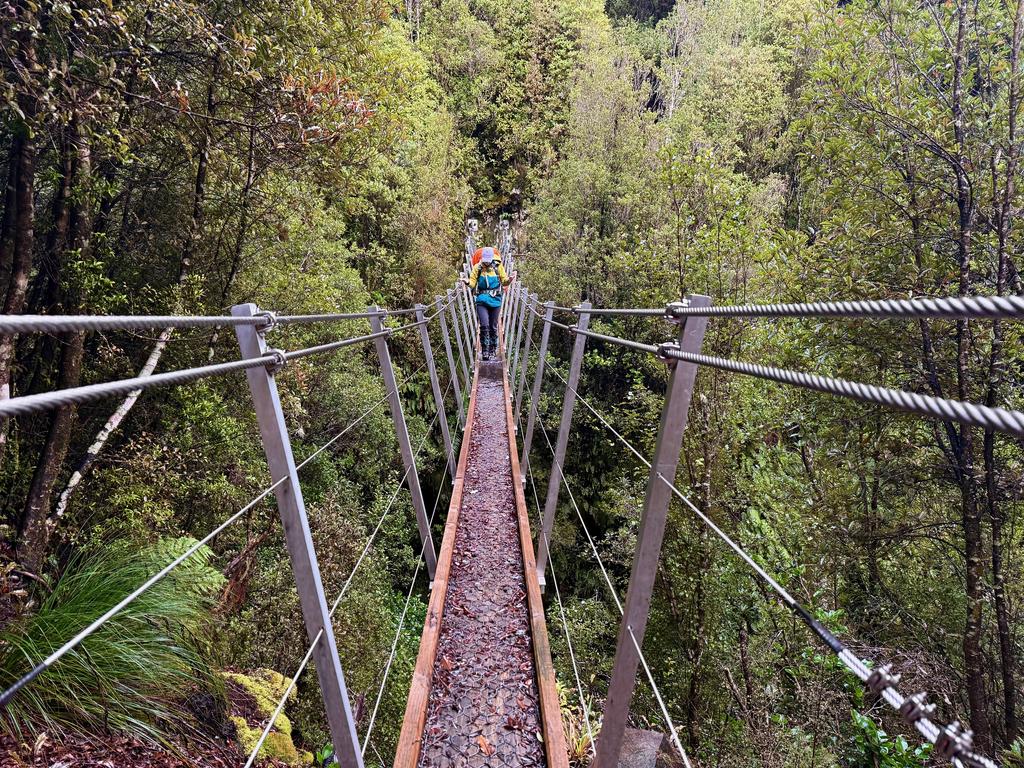Jen on the new looking swing bridge across the Toaroha.