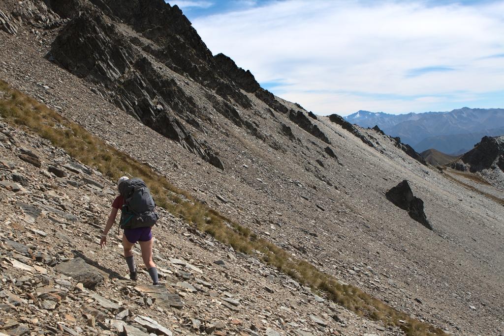 Traversing some scree on the way up to Dingle Peak.