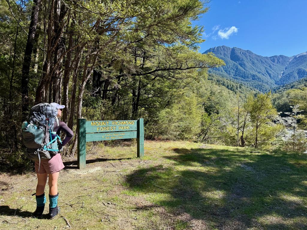Examining the tall looking hills knowing that we've got to get up there today with our weighty packs.
