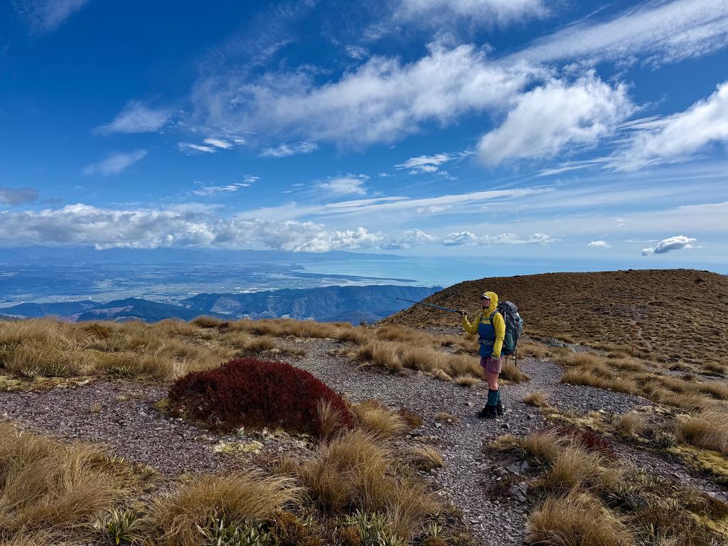 Jen gesturing about something long forgotten. Howling wind.
