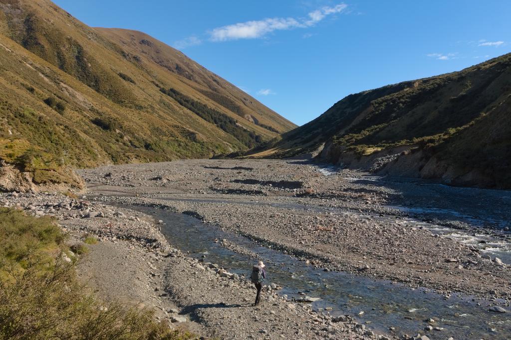 Jen heading up Swift River from Cookies Hut.