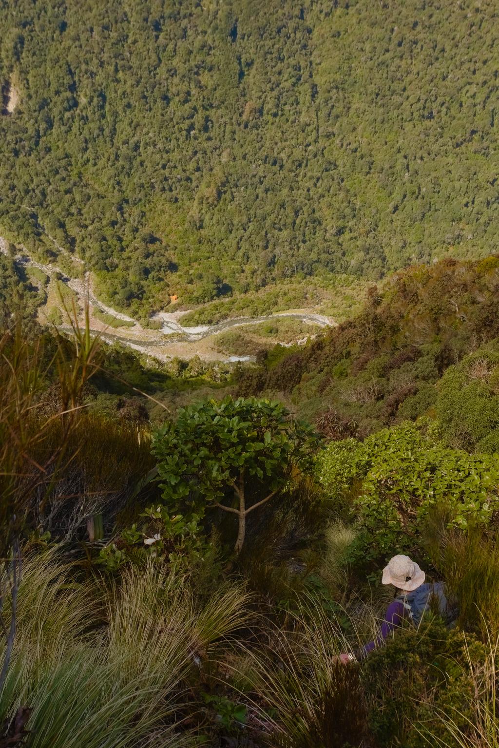 Jen making her way down the chute to Top Crooked Hut.